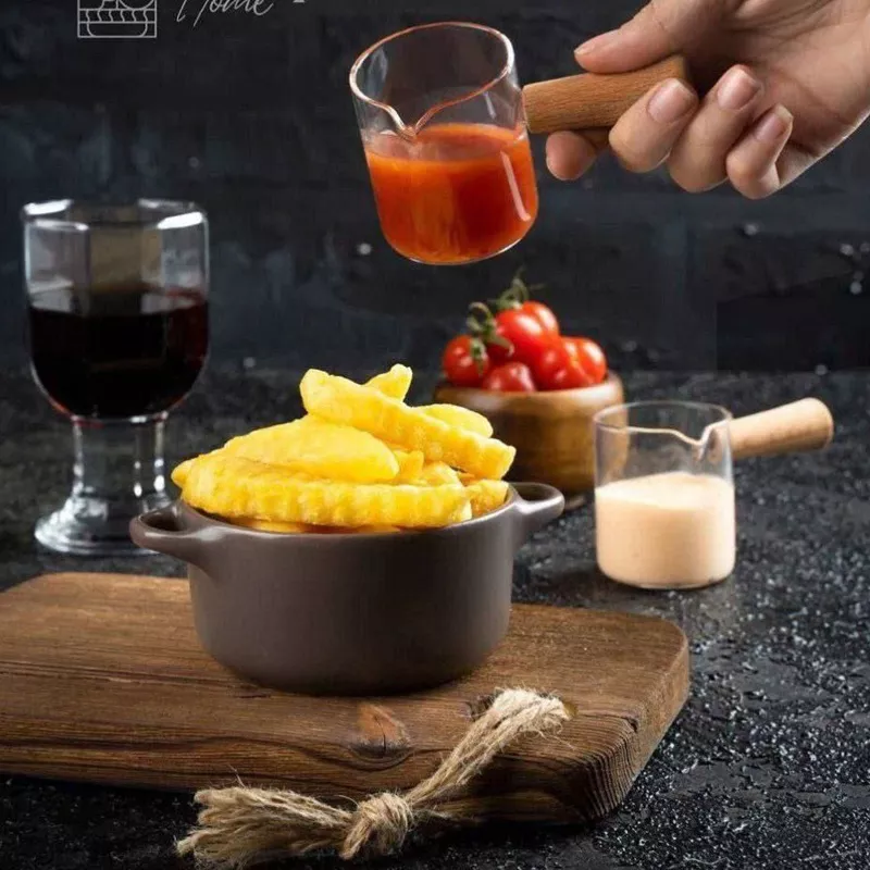 Pyrex-sauce-dish-with-wooden-handle-single-and-large-