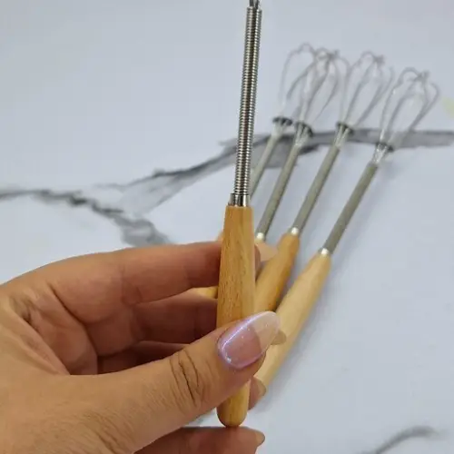 Hand-held coffee stirrer with bamboo handle, new model, single and bulk code