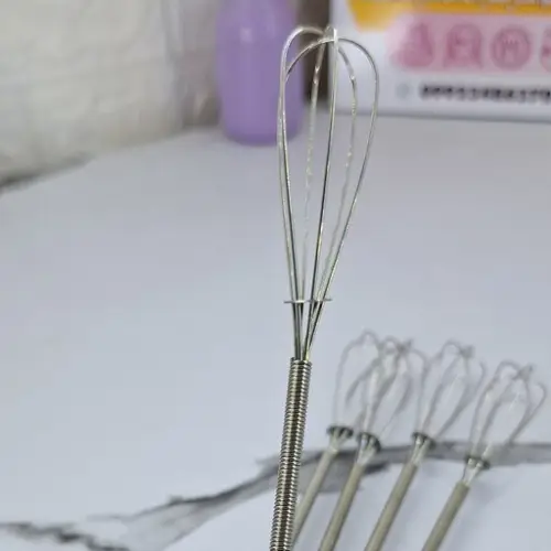 Hand-held coffee stirrer with bamboo handle, new model, single and bulk code