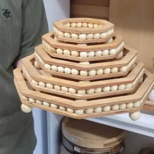 Five-piece riser with single- and major-code nut