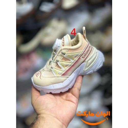 Children's shoes with adhesive