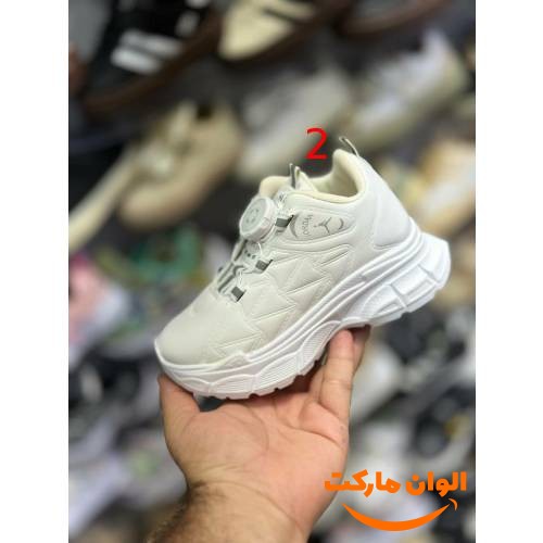 Children's shoes with adhesive
